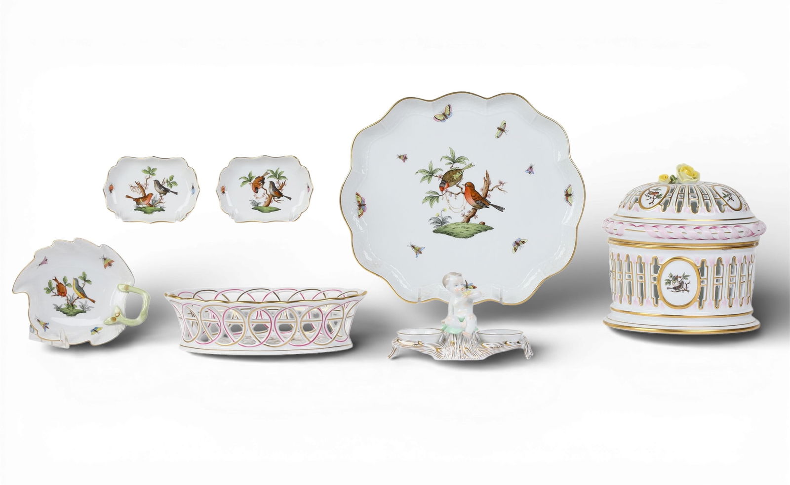 A group of seven Herend porcelain table articles in the Rothschild Bird pattern: A group of seven Herend porcelain table articles in the Rothschild Bird patternBiscuit Jar; height 7 1/2in (19cm); diameter7in (17.5cm) Provenance:Property from a Private Collection, Beverly Hills, Ca
