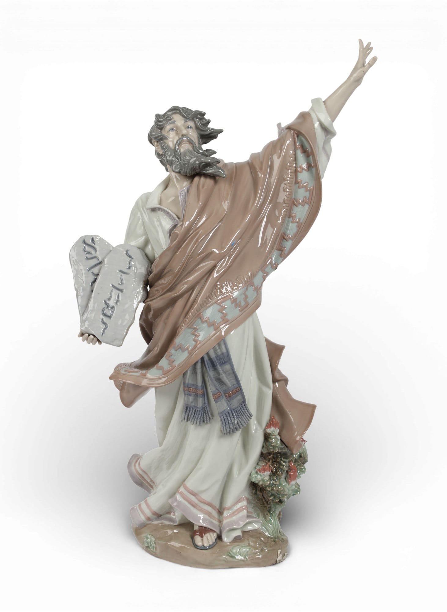 A Lladro figure of Moses: A Lladro figure of Moses height 21in (53.5cm); width 12 1/2in (32cm); depth 8in (20cm) Provenance: Property from a Private Collection, Beverly Hills, California.