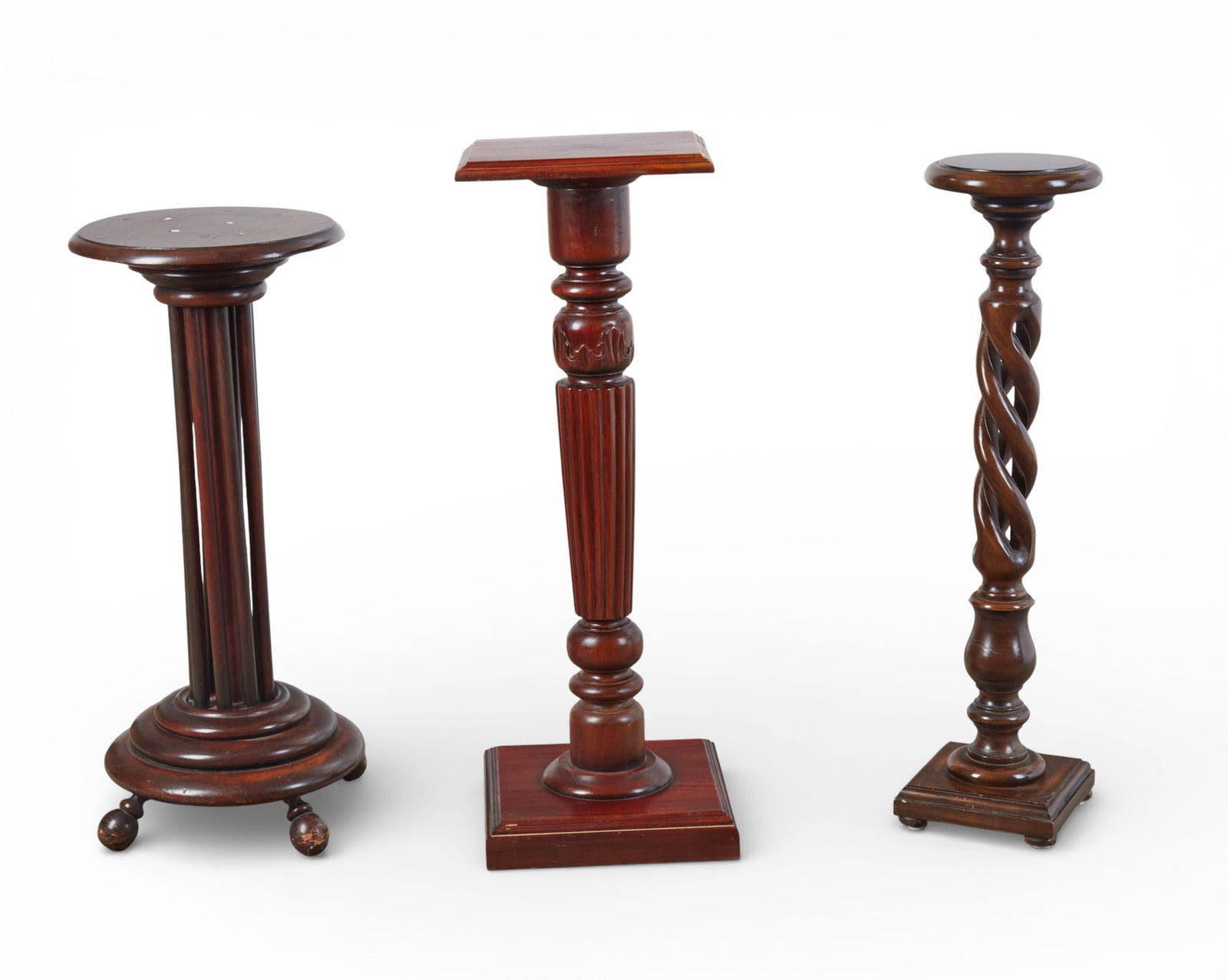 A group of three mahogany pedestals (1 of 5)