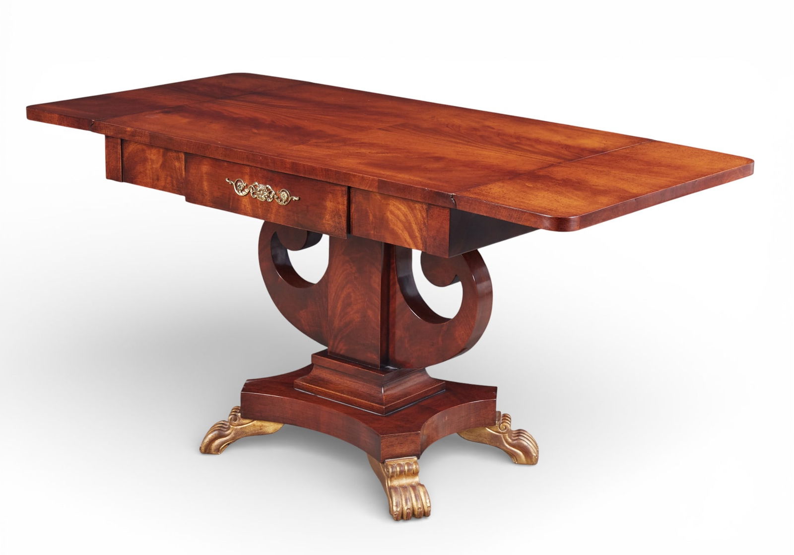 An Italian Biedermeier style mahogany pedestal sofa table: An Italian Biedermeier style mahogany pedestal sofa tableW/out leaf: height 30 x width 38 x depth 27 in. (76.2 x 96.5 x 68.6 cm.)