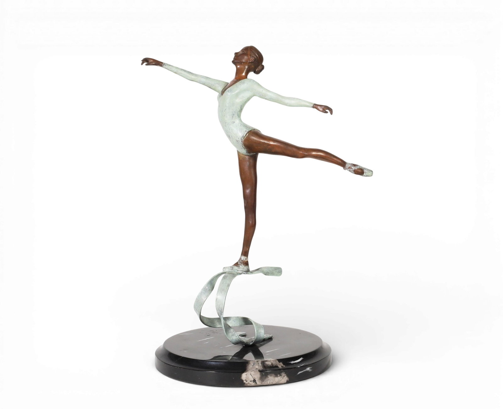 Victor Villarreal a limited edition painted bronze figure of a ballerina on marble base: Victor Villarreal a limited edition painted bronze figure of a ballerina on marble baseSigned and numbered 1/99.height 11 1/2in (29cm); diameter of base 6 1/4in (16cm) Provenance:Property from a Priv