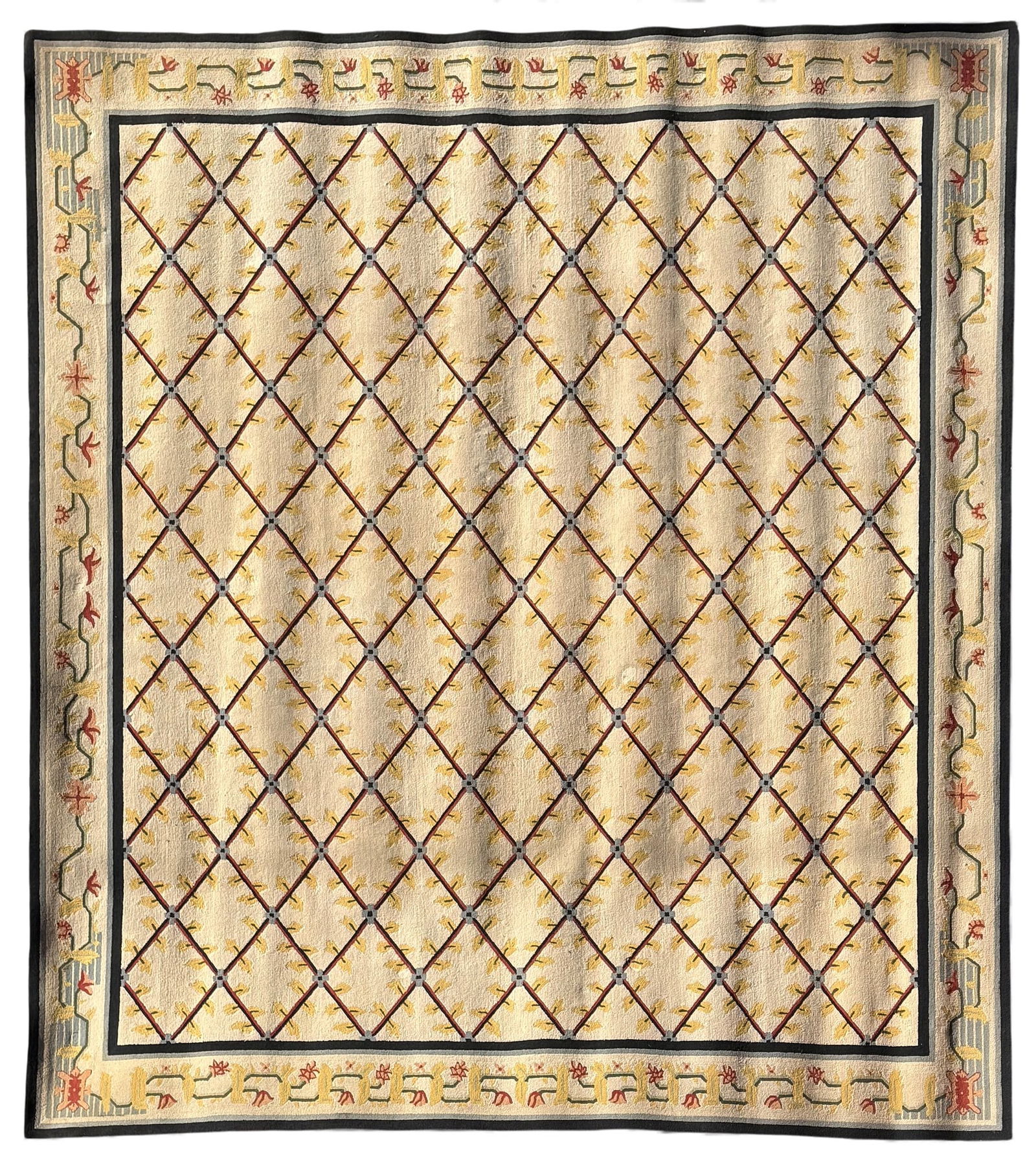 A wool rug with geometric lattice design (1 of 3)