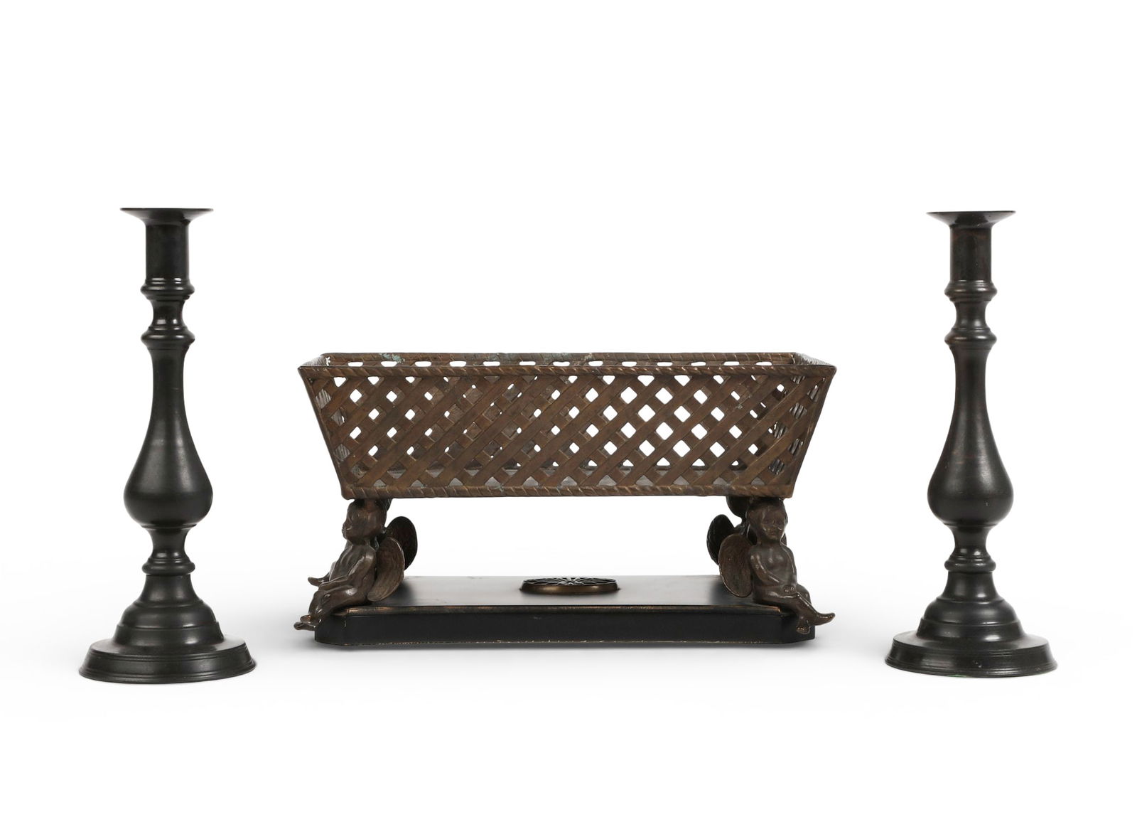 A metal jardiniere together with a pair of candle sticks. (1 of 5)