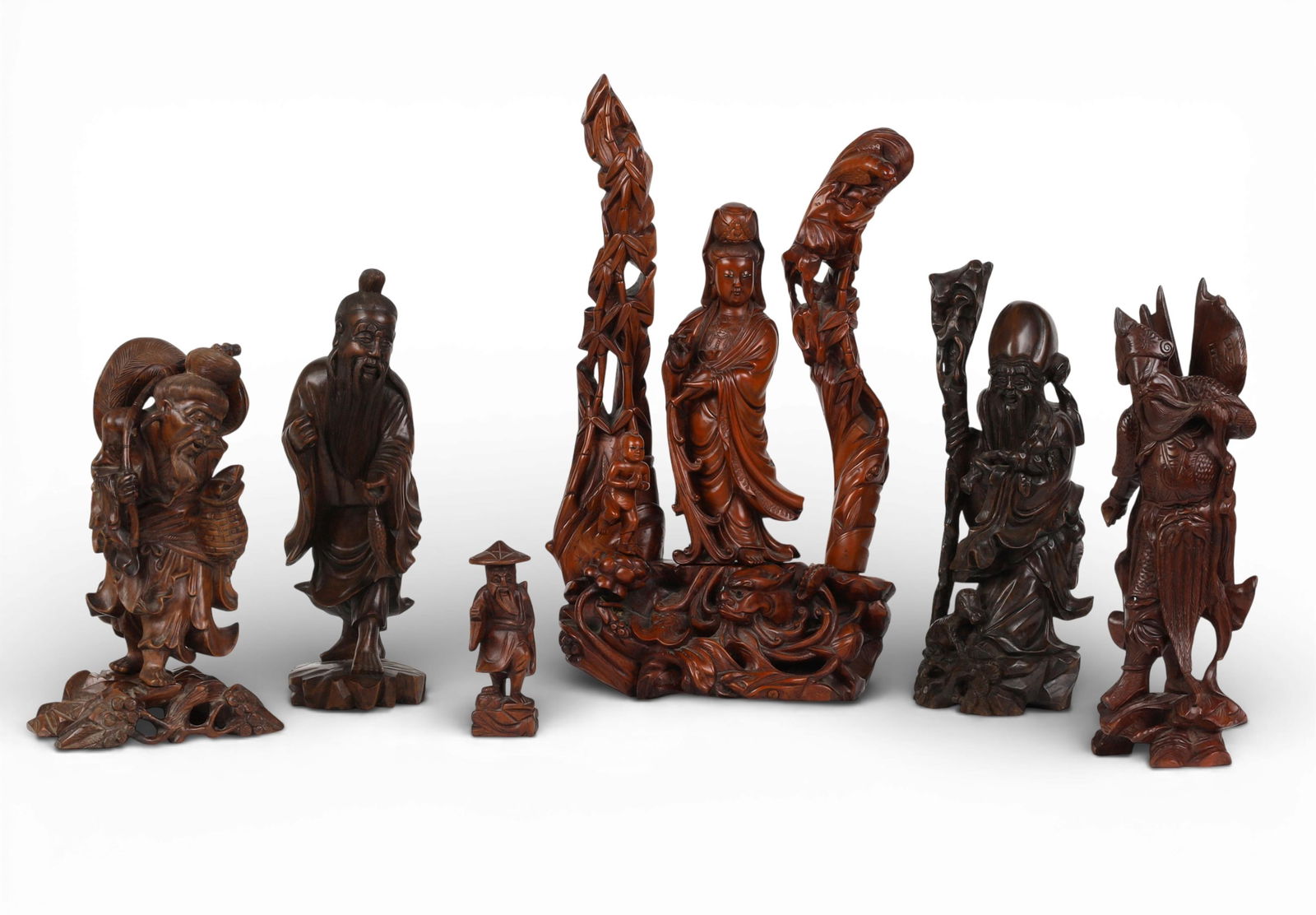 A group of six Chinese carved hardwood figures (1 of 9)