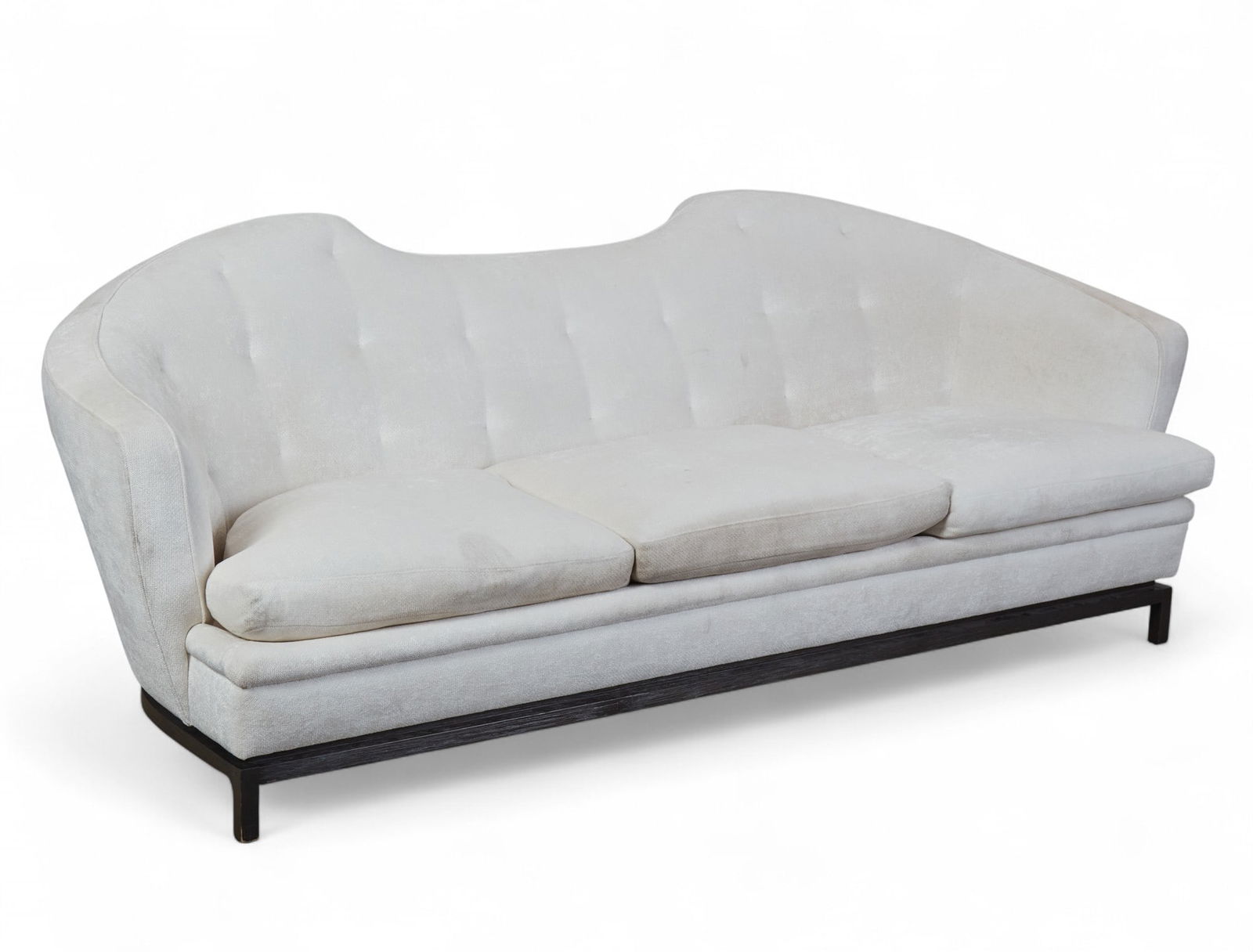 A white upholstered three seat sofa (1 of 5)