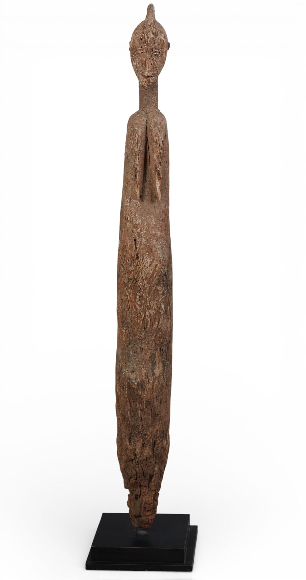 A carved wood African sculpture on metal stand (1 of 5)