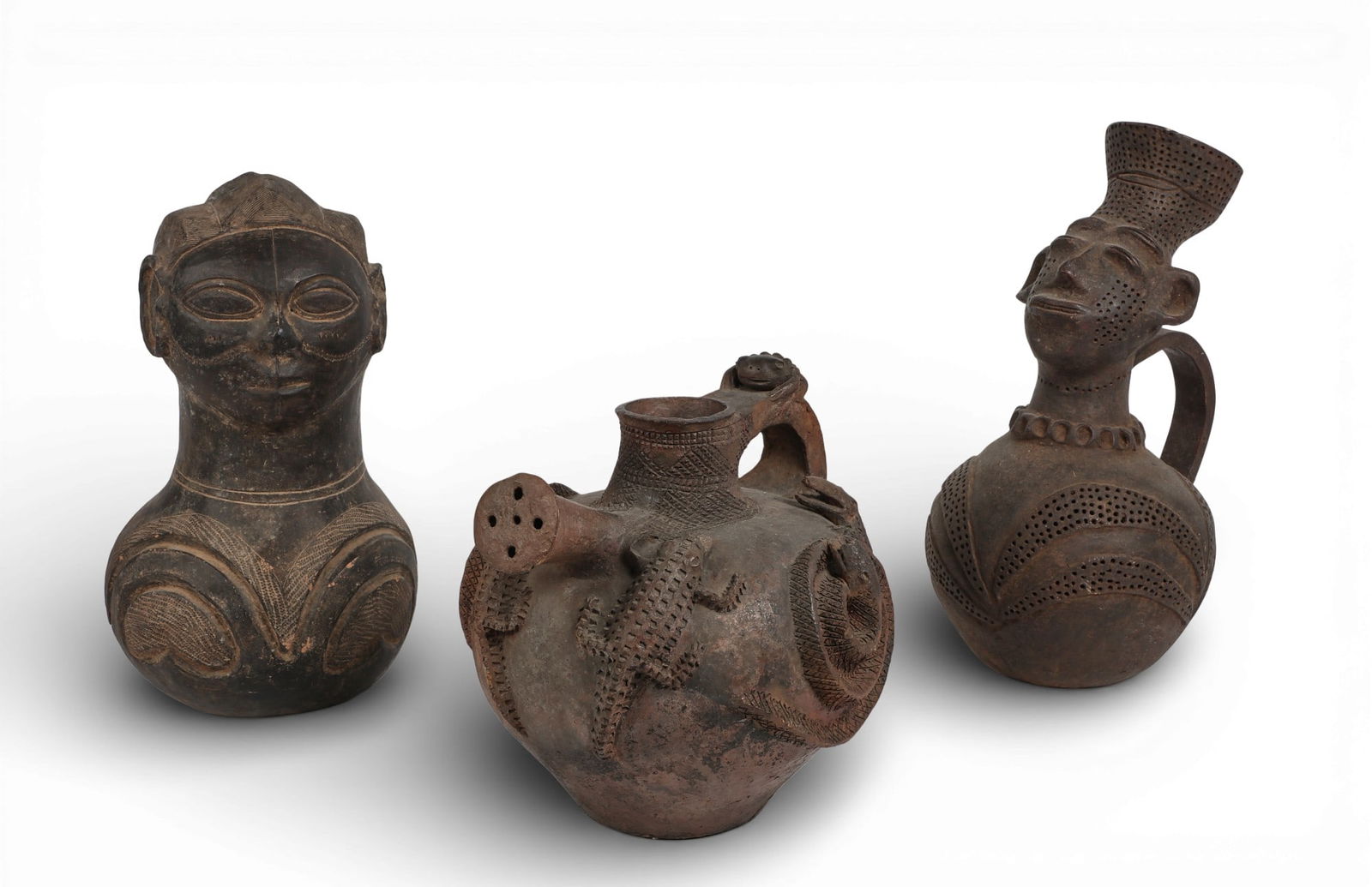 A group of three terracotta tribal vessels. (1 of 5)