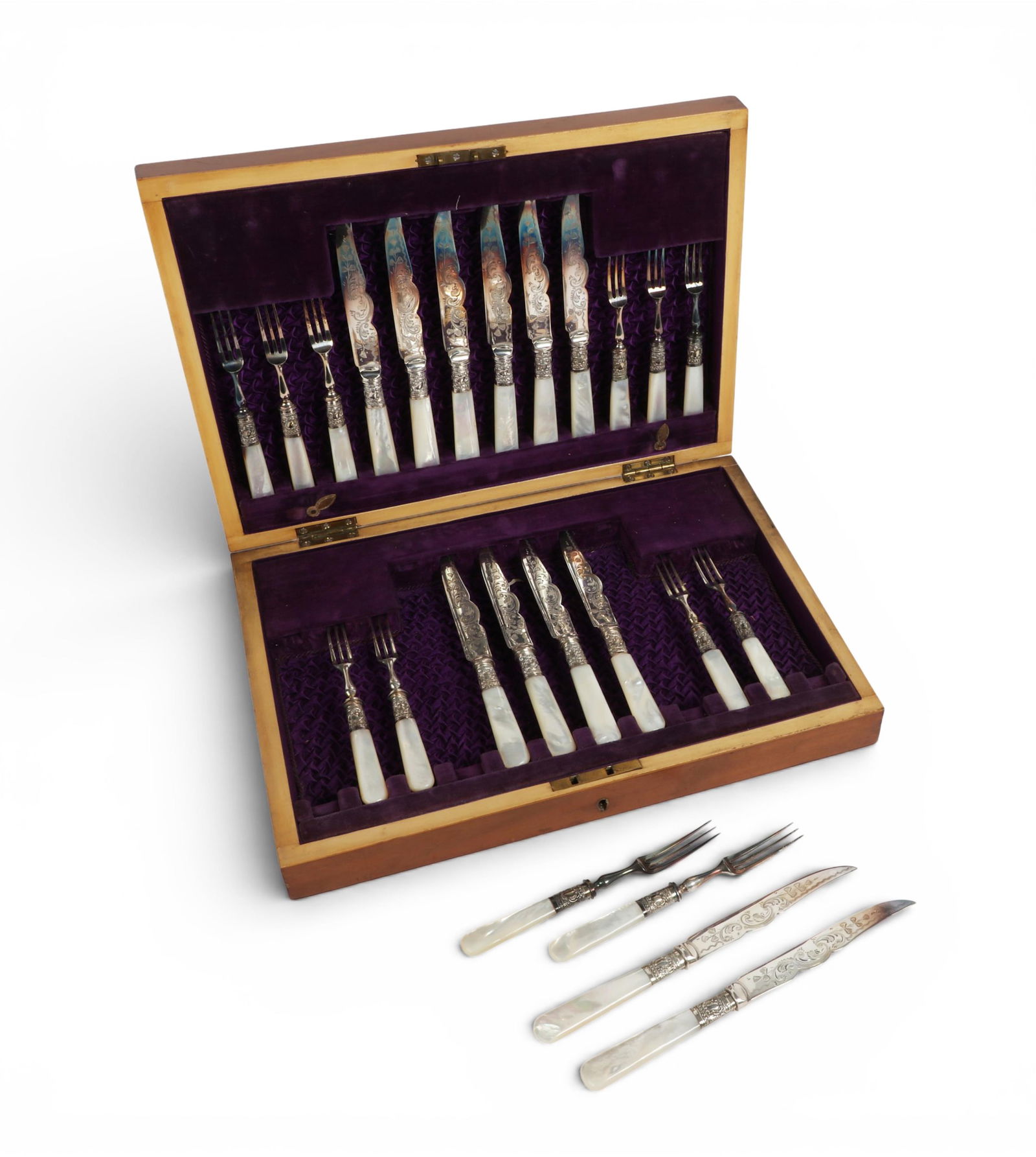 A twenty four piece English fruit set with mother of pearl handle in a fitted box (1 of 5)