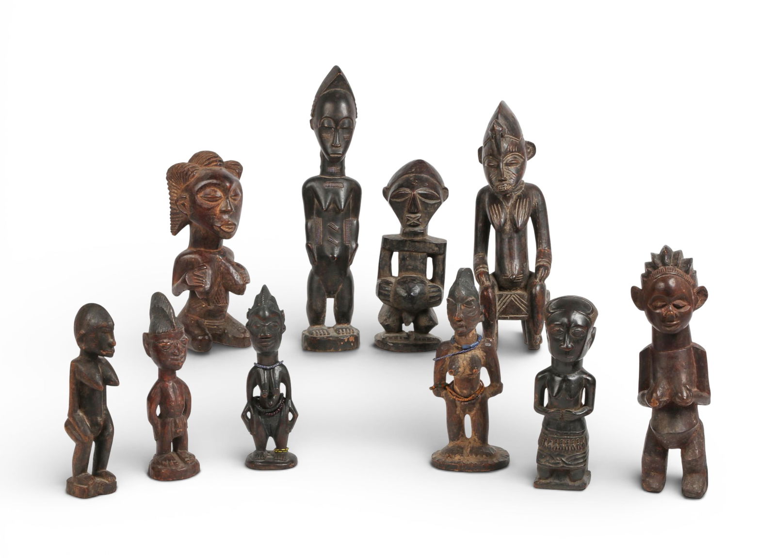 A group of ten carved wood african figures. (1 of 6)