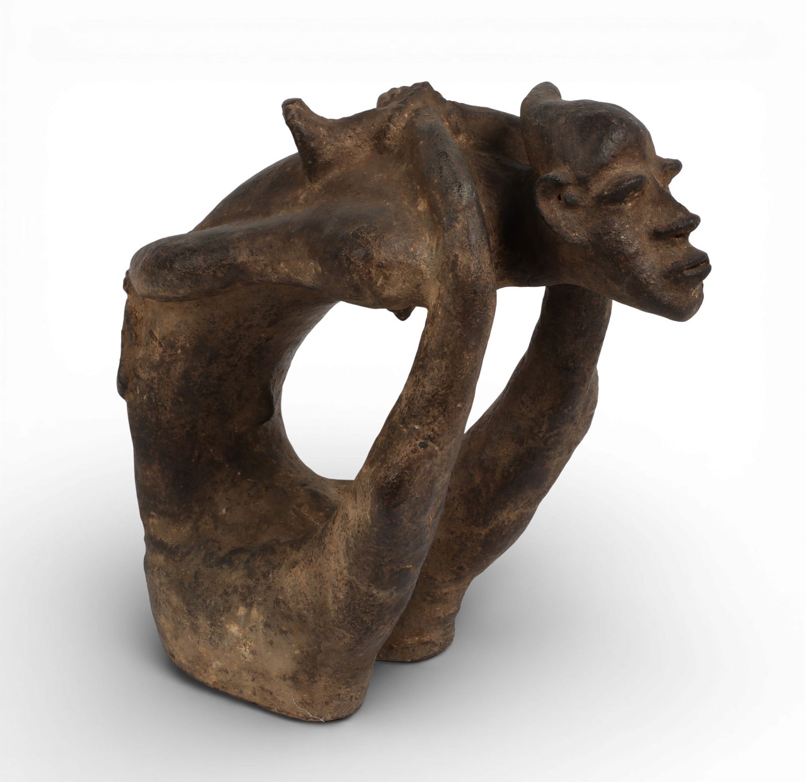 A carved stone african figure. (1 of 4)