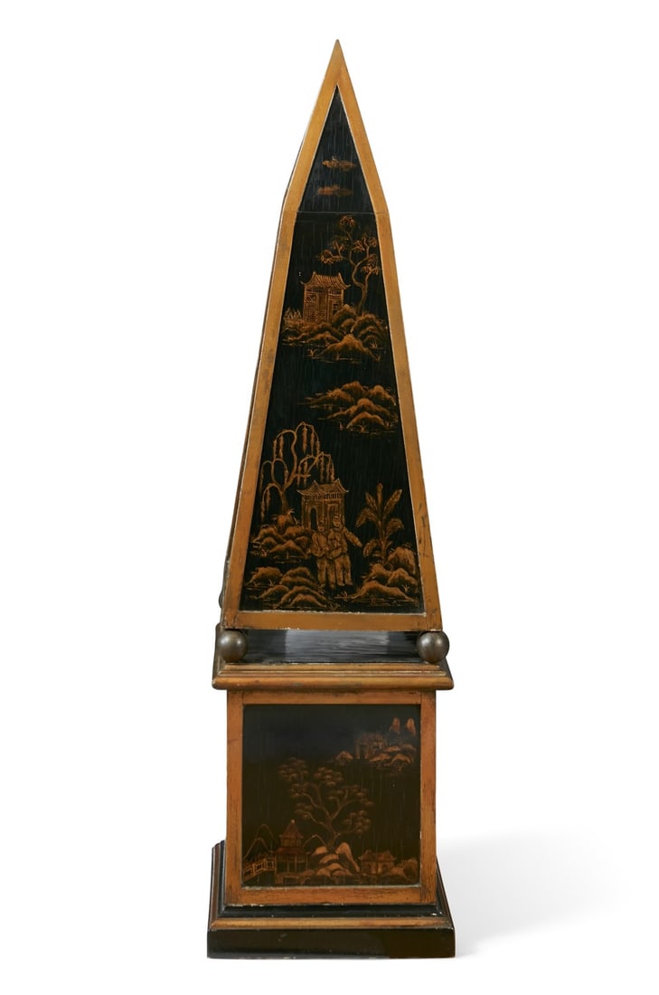 A Continental parcel gilt black lacquer Chinoiserie decorated obelisk, 20th century: A Continental parcel gilt black lacquer Chinoiserie decorated obelisk 20th century from john nelson collection height 44 1/2in (113cm); width 12in (30.5cm) square Provenance: ex collection of John Nel