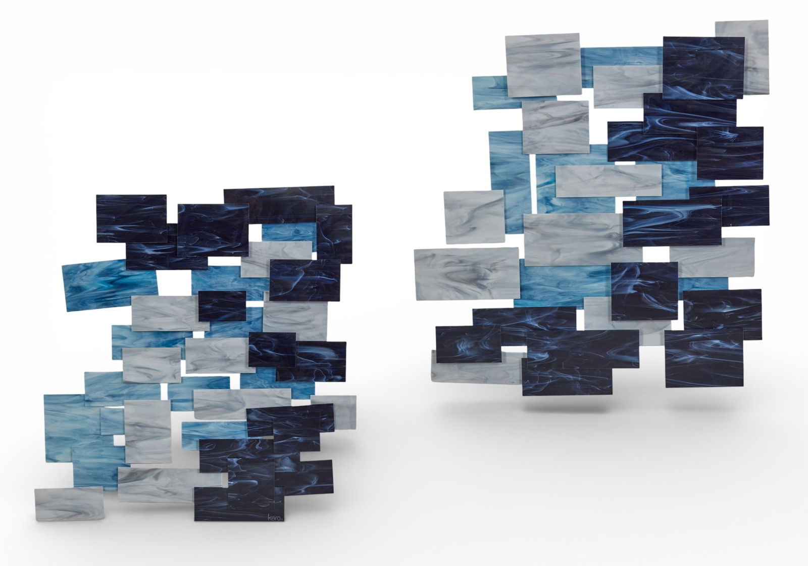 A pair of Karo Studios glass and metal abstract sculpture: A pair of Karo Studios glass and metal abstract sculpture 41 x 41 in. (104.1 x 104.1 cm.)