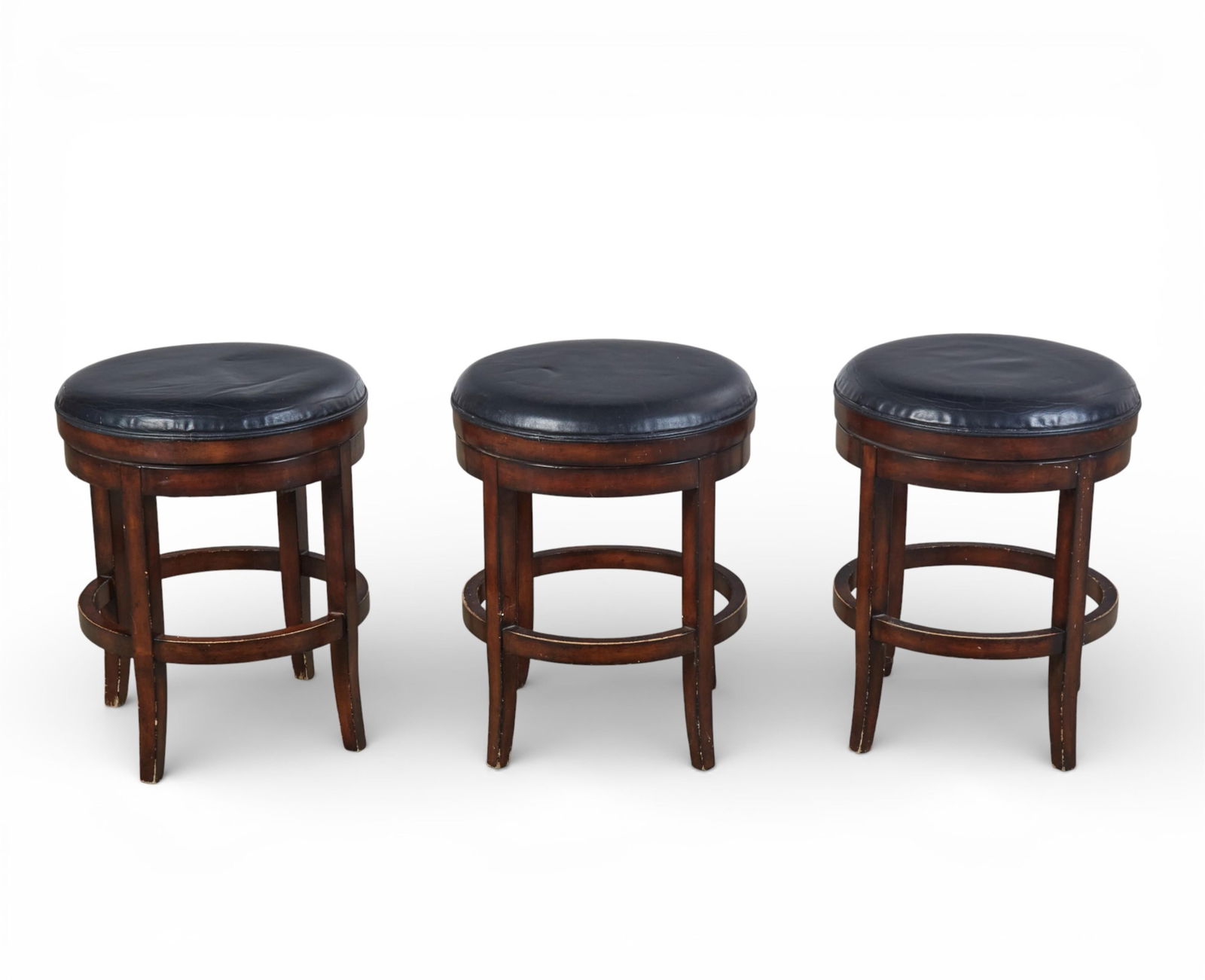 A group of three swivel barstools with faux leather upholstery (1 of 4)