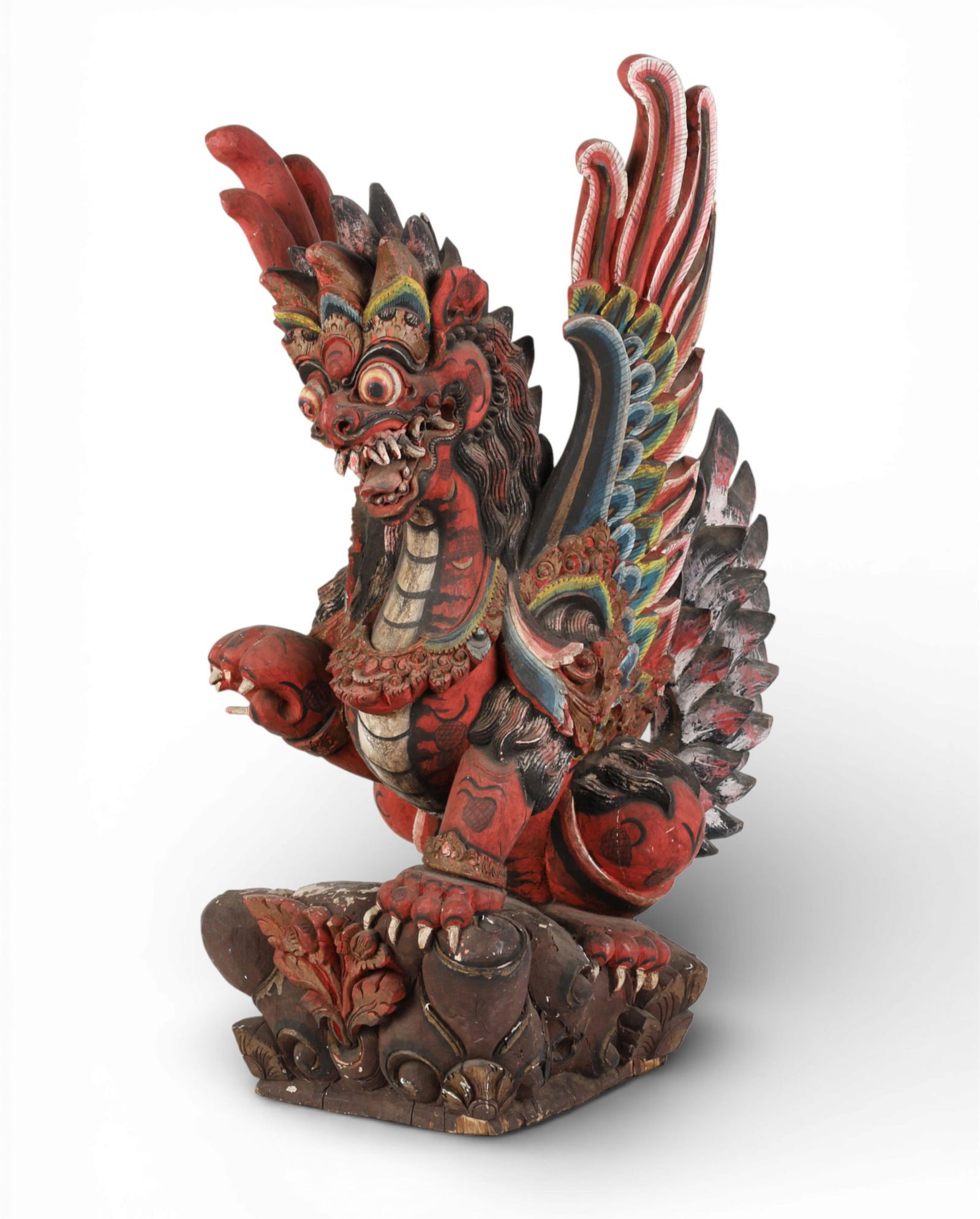 A Balinese polychrome and carved wood sculpture of a dragon (1 of 10)