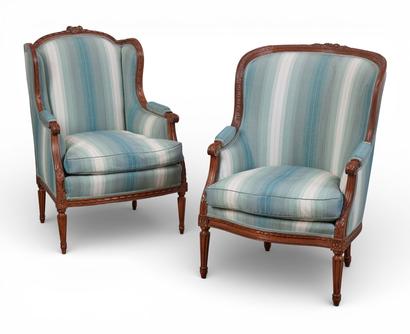 A pair of Louis XV style bergeres with blue stripe upholstery . (1 of 5)