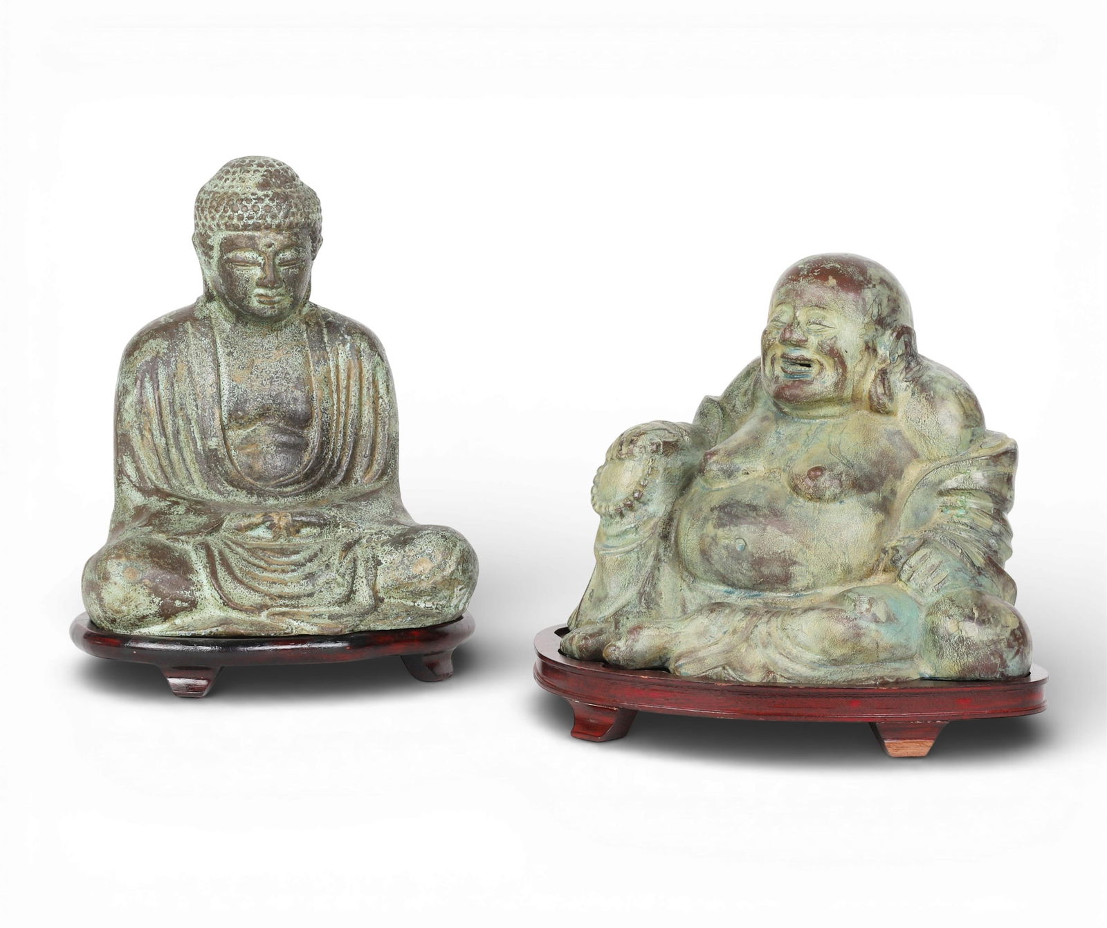 A group of two Asian bronze Buddha figures on wooden stands (1 of 6)