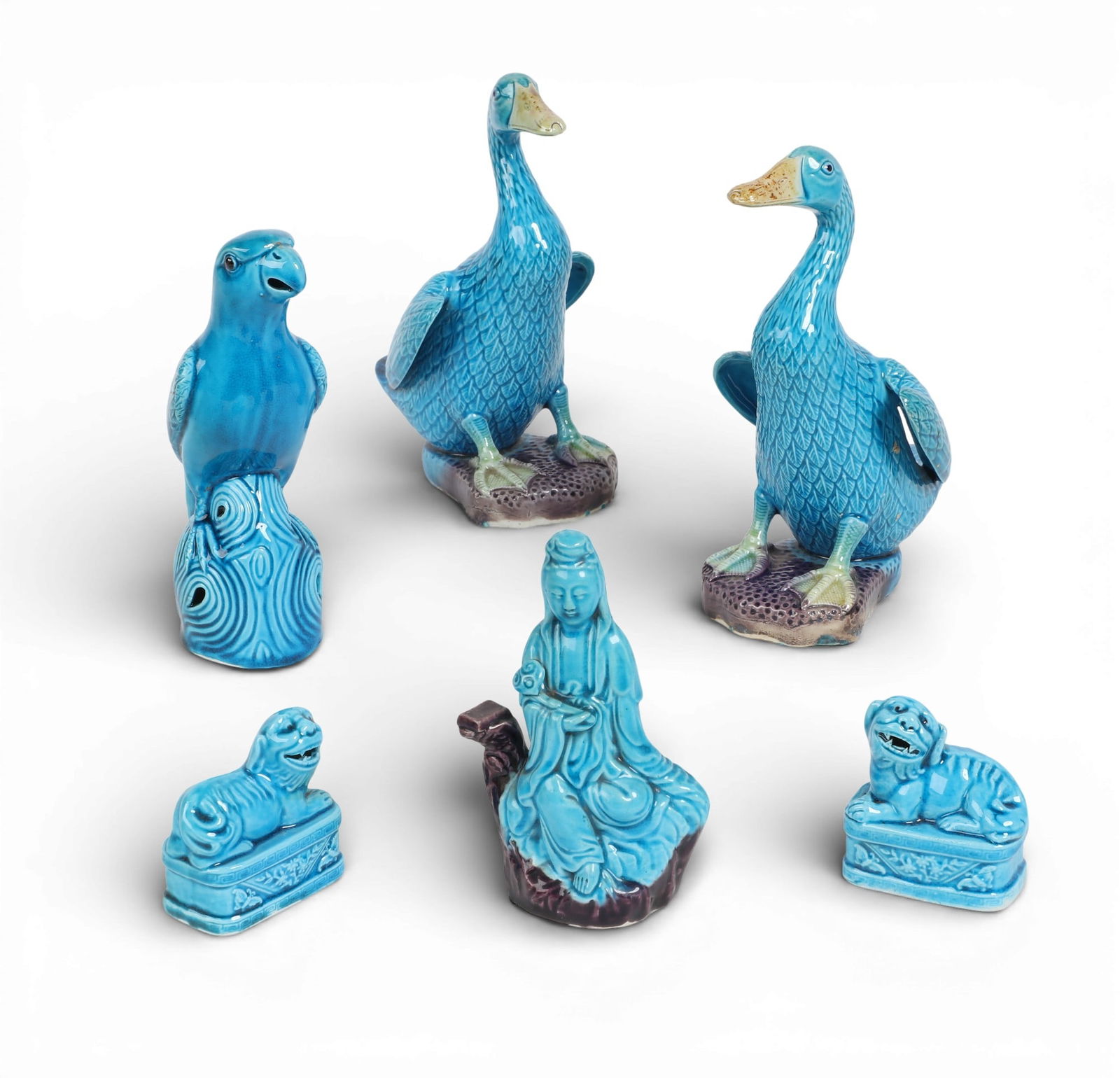 A group of six Chinese blue glazed figures (1 of 3)