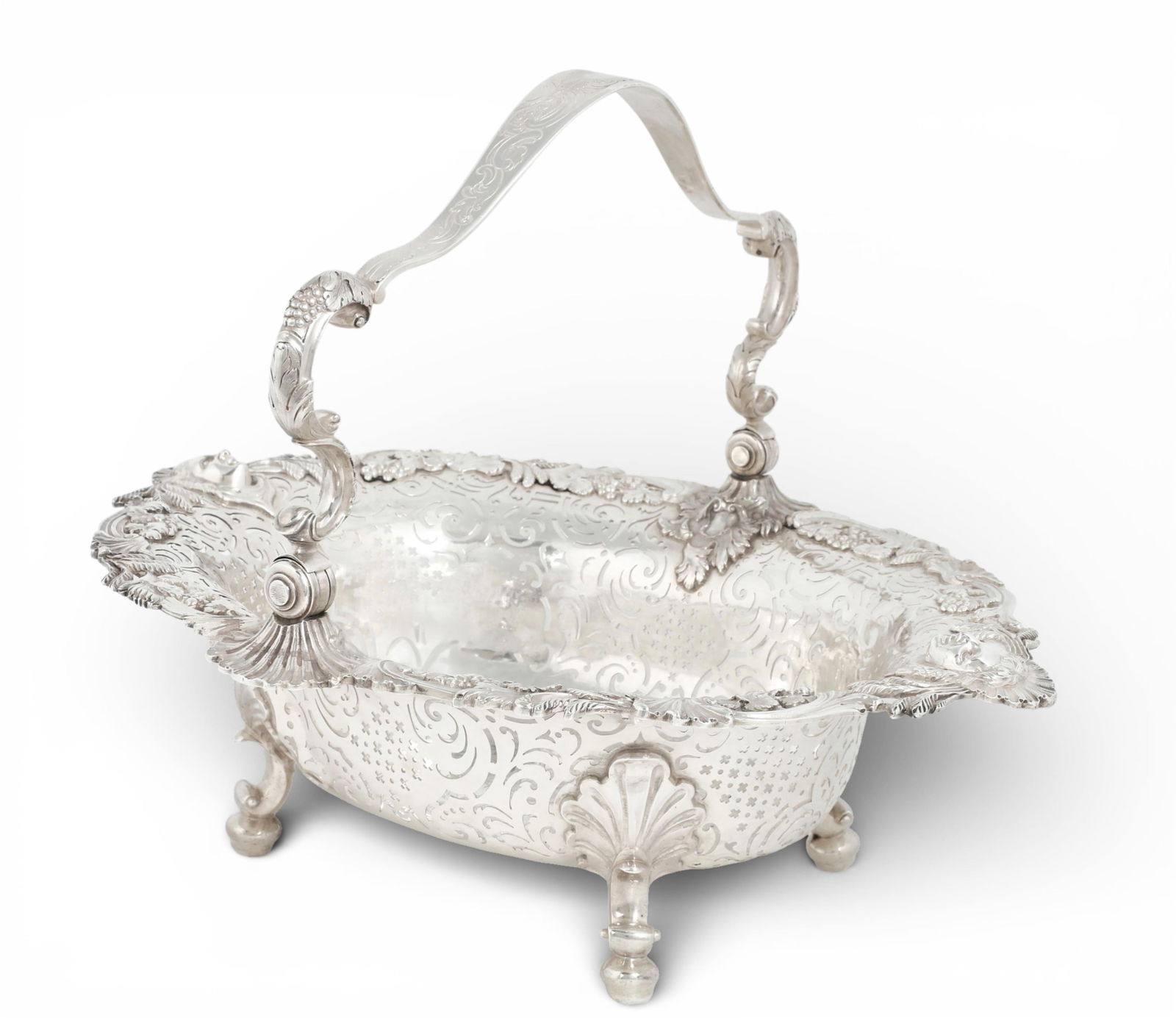 An Irish George II sterling silver swing handle cake basket, Robert Calderwood, Dublin, 1750 (1 of 8)