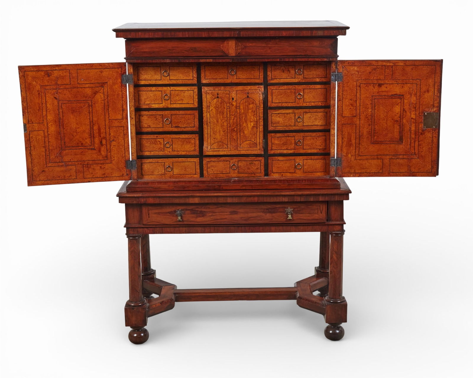 A Continental walnut and parquetry cabinet on stand, 18th century, top and base associated (1 of 16)