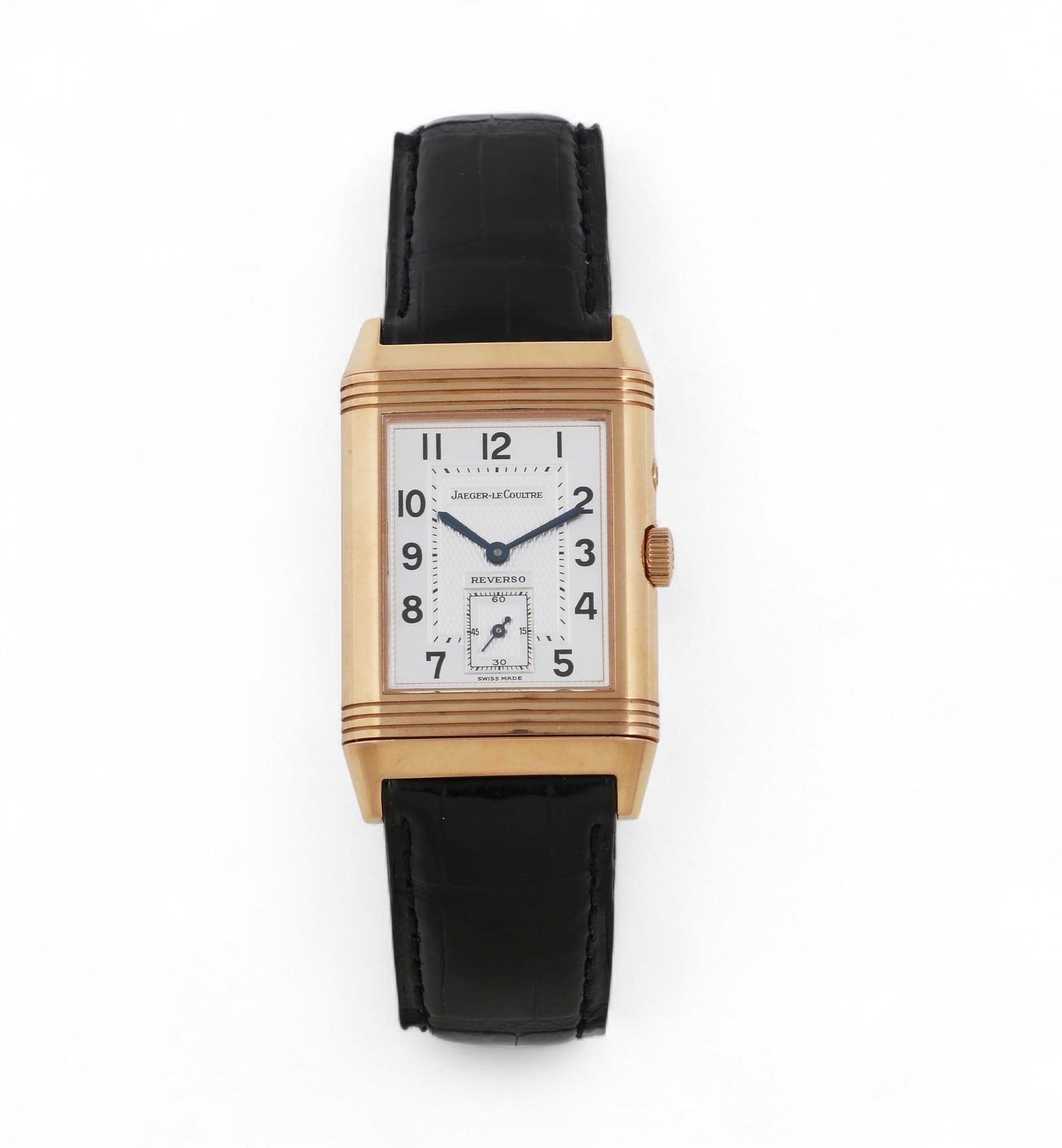 Jaeger Le Coultre: A Reverso Duoface 18K rose gold strap wristwatch: Jaeger Le Coultre: A Reverso Duoface 18K rose gold strap wristwatchSigned on case, both dials, and clasp; rectangular case with one white dial with Arabic numbers, blued steel stick hands and a sunk s