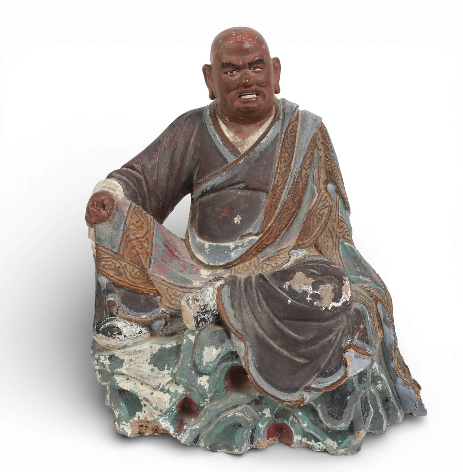 A Chinese polychrome decorated earthenware model of a seated Buddha (1 of 8)