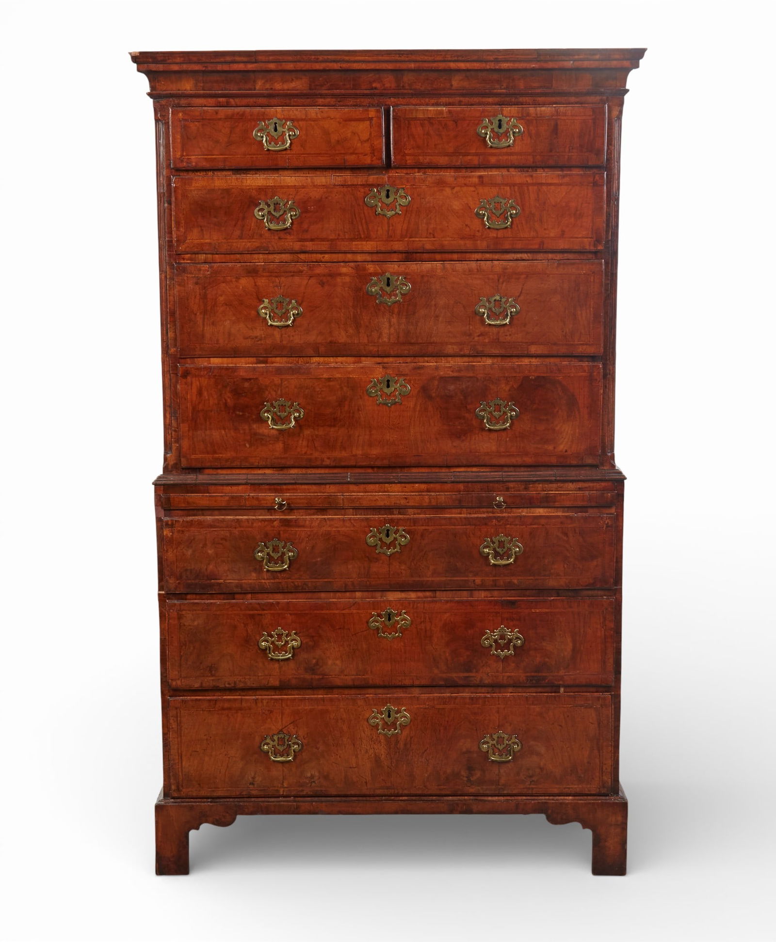 A George II walnut chest on chest, mid 18th century: A George II walnut chest on chestmid 18th centuryheight 71in (180.5cm); width 42 3/4in (108.5cm); depth 21 1/2in (54.5cm) Provenance:The Old Malthouse, Hungerford, England,1999.Property from th