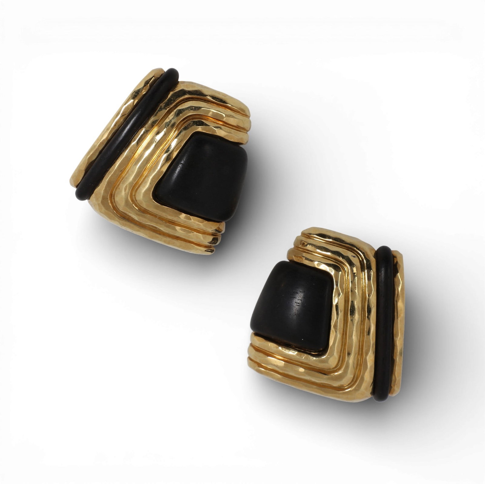 Henry Dunay: A pair of diamond, wood and 18K yellow gold earrings,approximately 1 x .75 to 1in: Henry Dunay: A pair of diamond, wood and 18K yellow gold earringsAsymmetrical fluted clip-on earrings set with ebonized wood.approximately 1 x .75 to 1in (27.5mm high x 20.0 to 26.5mm); gross weight a