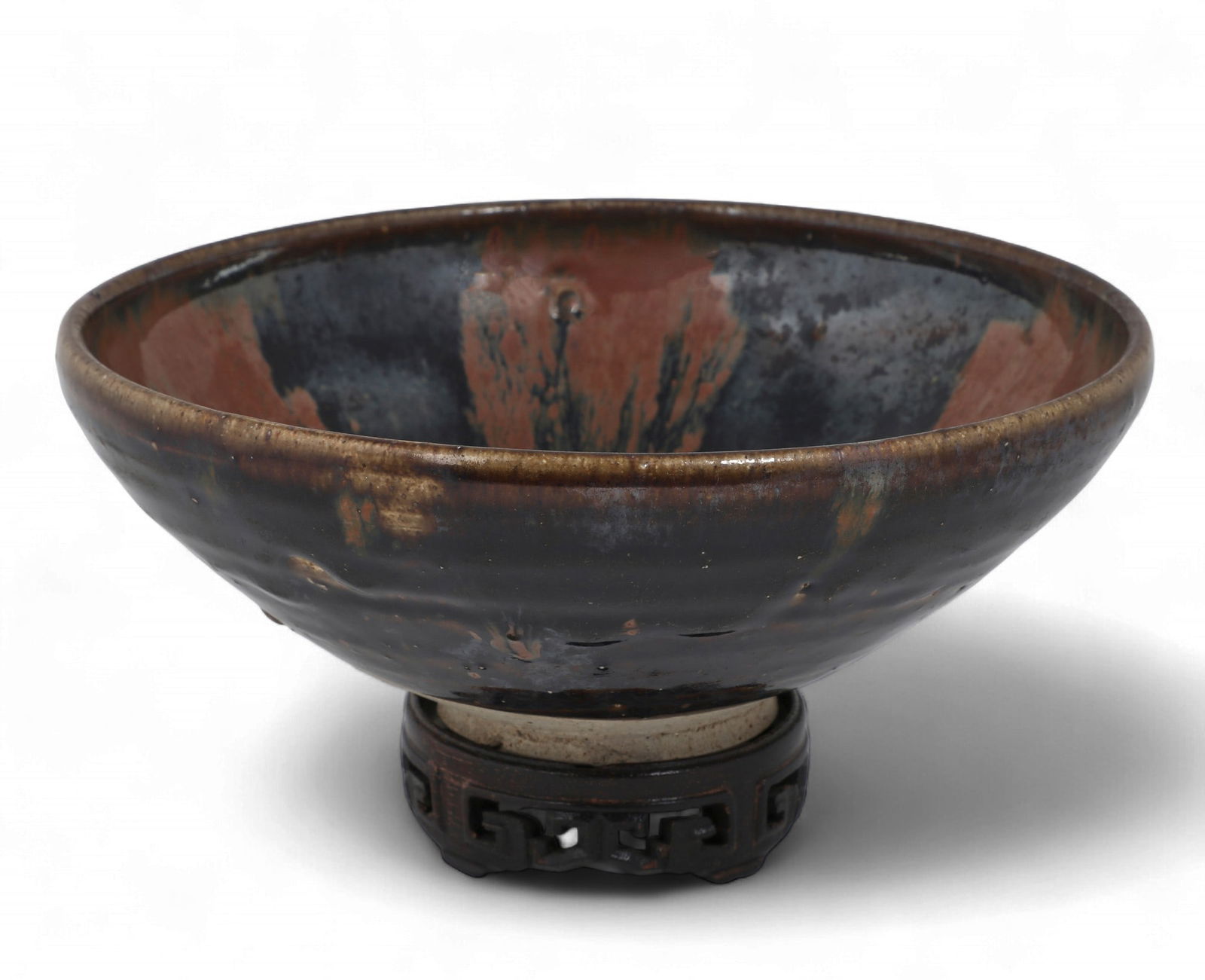A Chinese northern blackware Cizhou style pale stonewarepartridge-feather' conical bowl (1 of 3)