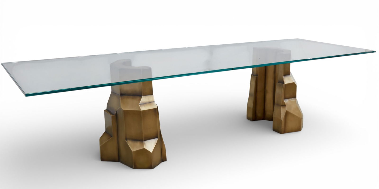 A Magni Design weathered bronze and glass Mesa dining table, modern: A Magni Design weathered bronze and glass Mesa dining tablemodernSigned to base of one pedestal.height 29in (74cm)); width 120 1/2in (306cm); depth 42in (106cm) Provenance:Property from a Priv