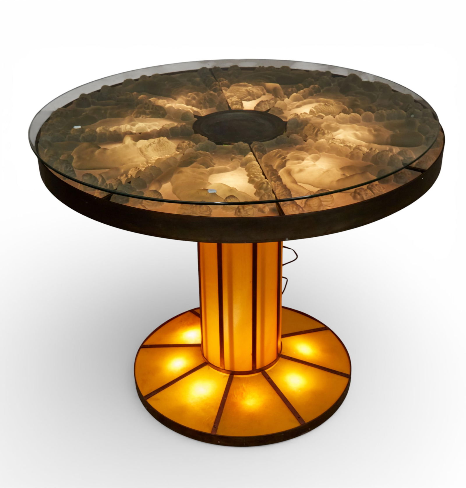 An Art Deco style bronze, yellow and frosted clear glass illuminated center table, After Rene: An Art Deco style bronze, yellow and frosted clear glass illuminated center tableAfter Rene Lalique (1860-1945)20th centuryWith eight molded frosted clear glass figural panels of a putto, one spurious