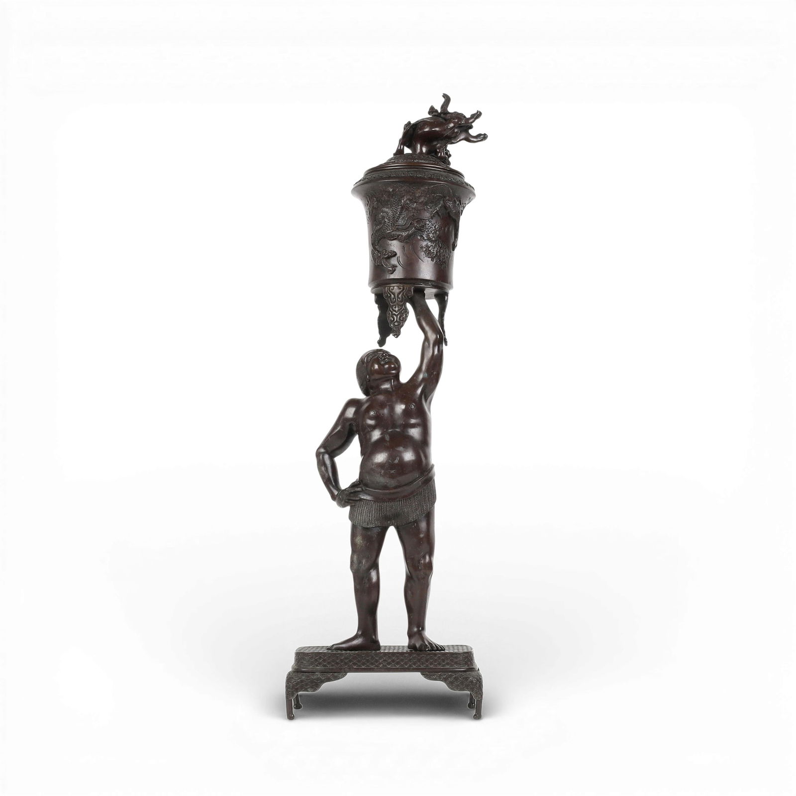 A Japanese patinated bronze okimono of a man supporting a koro (1 of 6)