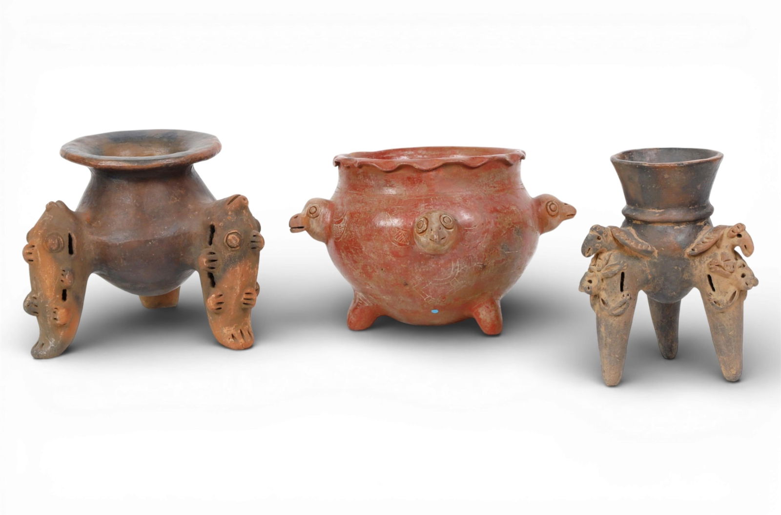 A group of three pottery vessels (1 of 4)