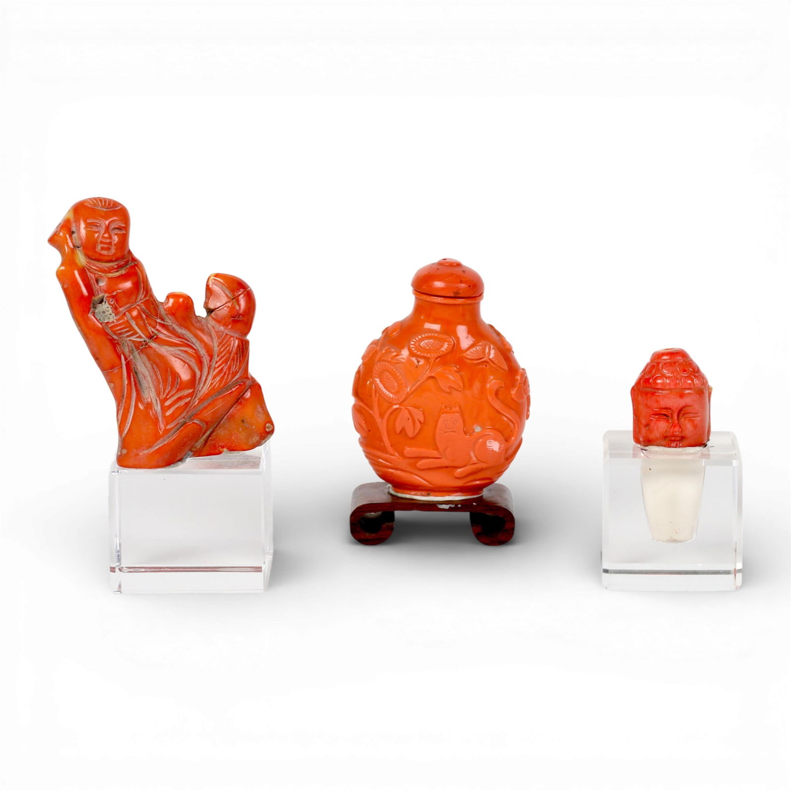 A group of three Chinese coral table articles on stands: A group of three Chinese coral table articles on stands Tallest Height: 5 in. (12.7 cm.)