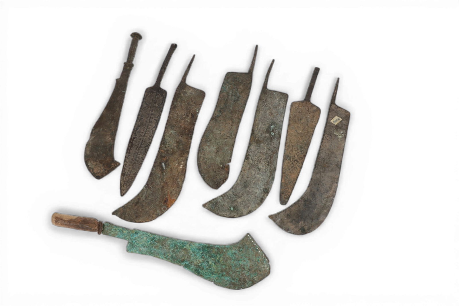 A group of eight metal cleavers: A group of eight metal cleavers Longest: length 23 in. (58.4 cm.)