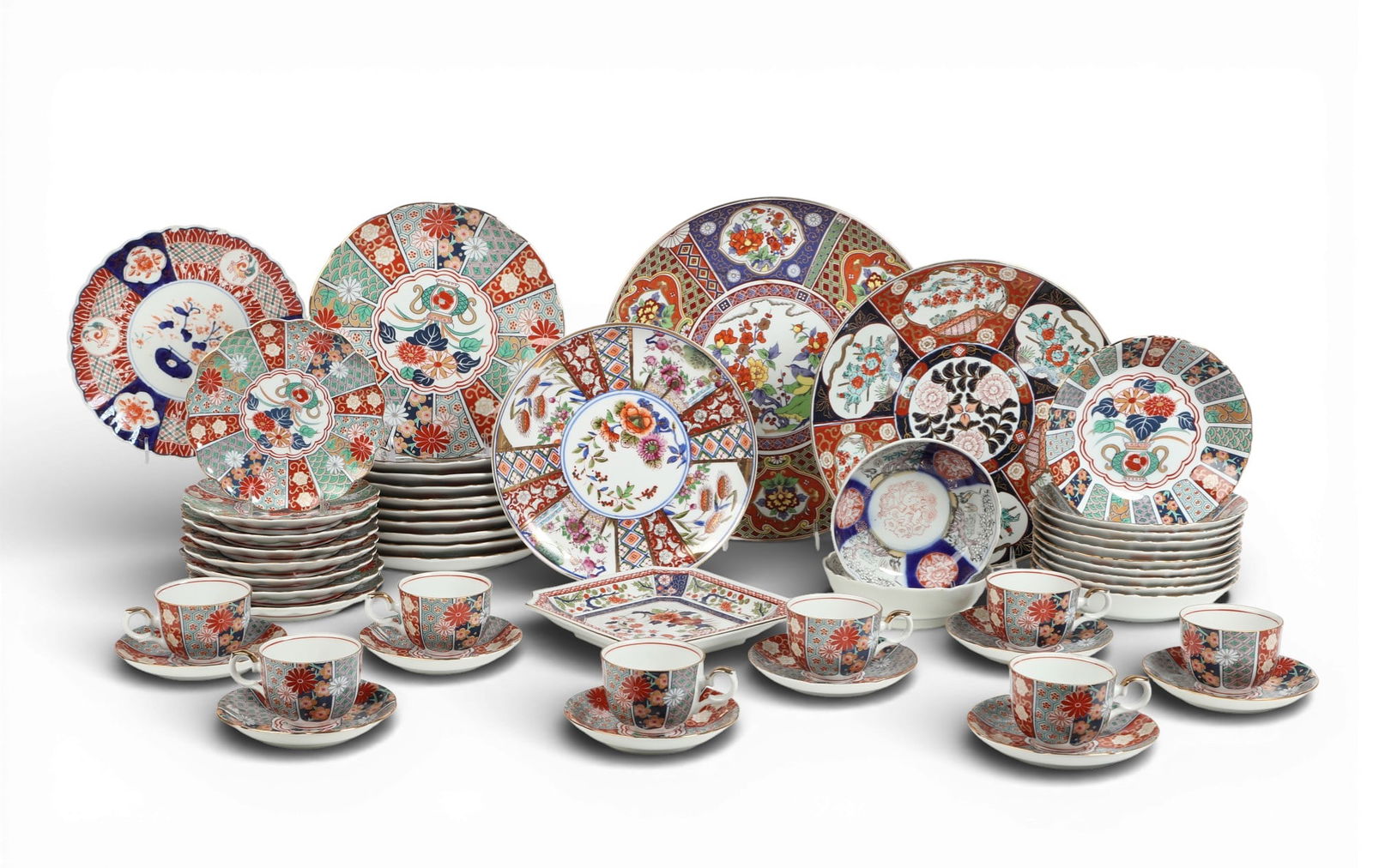 A group of fifty Japanese Amari painted items: A group of fifty Japanese Amari painted items Largest: diameter 14 in. (35.6 cm.)