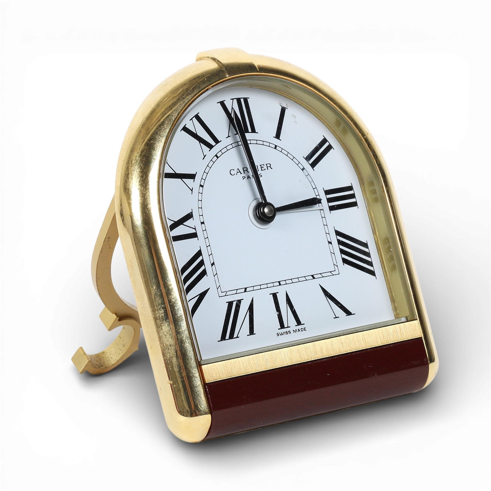 A gilt-brass and enamel Cartier desk timepiece, circa 1980: A gilt-brass and enamel Cartier desk timepiece, circa 1980 serial number: 08732 height 3 1/2 x width 3 in. (8.9 x 7.6 cm.)