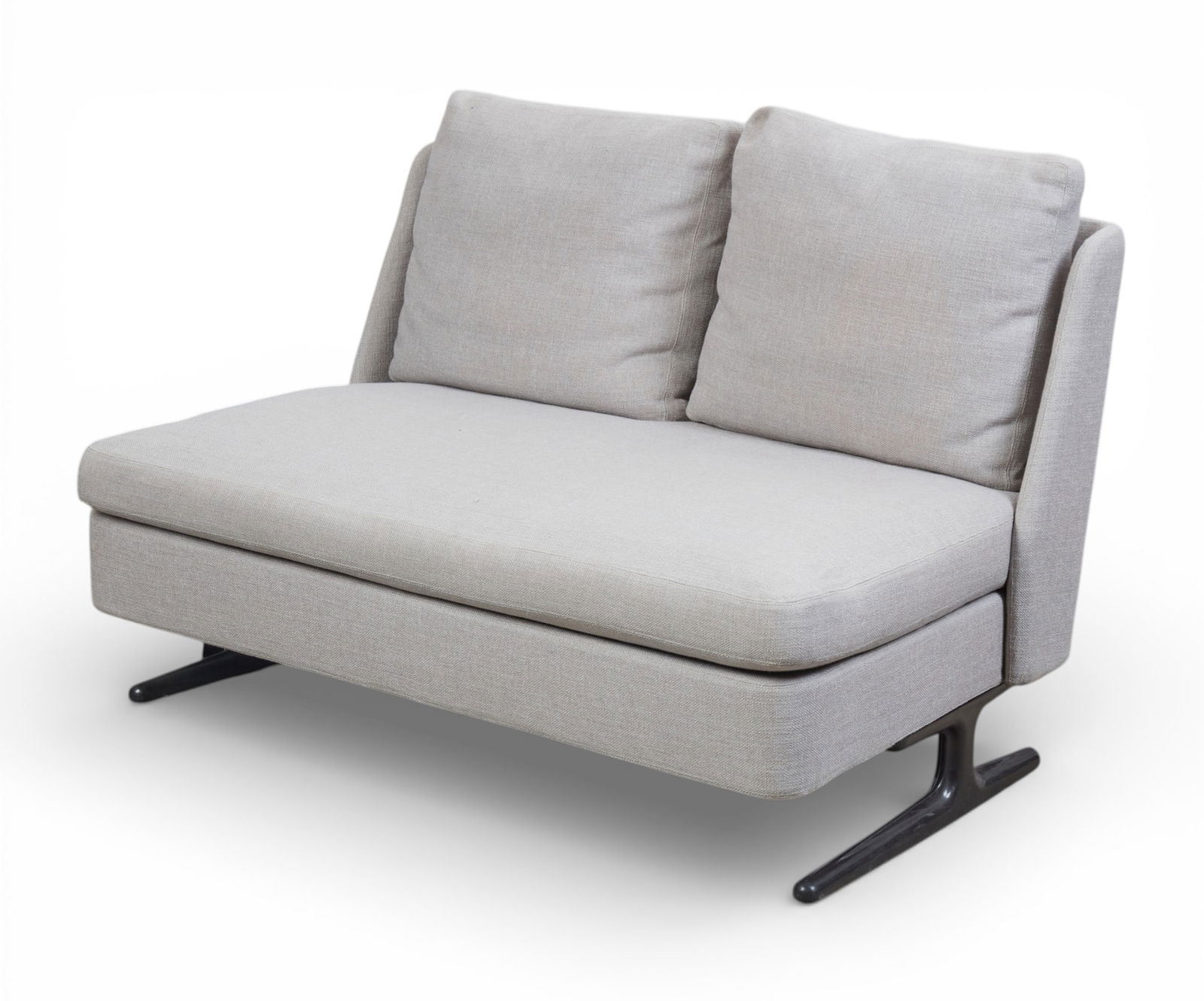 A sofa on metal base: A sofa on metal base height 30 x width 49 x depth 34 in. (76.2 x 124.5 x 86.4 cm.)