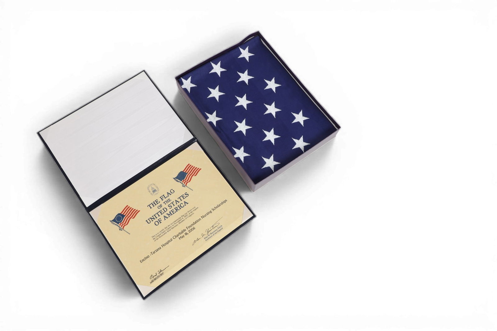 An American flag flown over the United States Capital in original box (1 of 3)