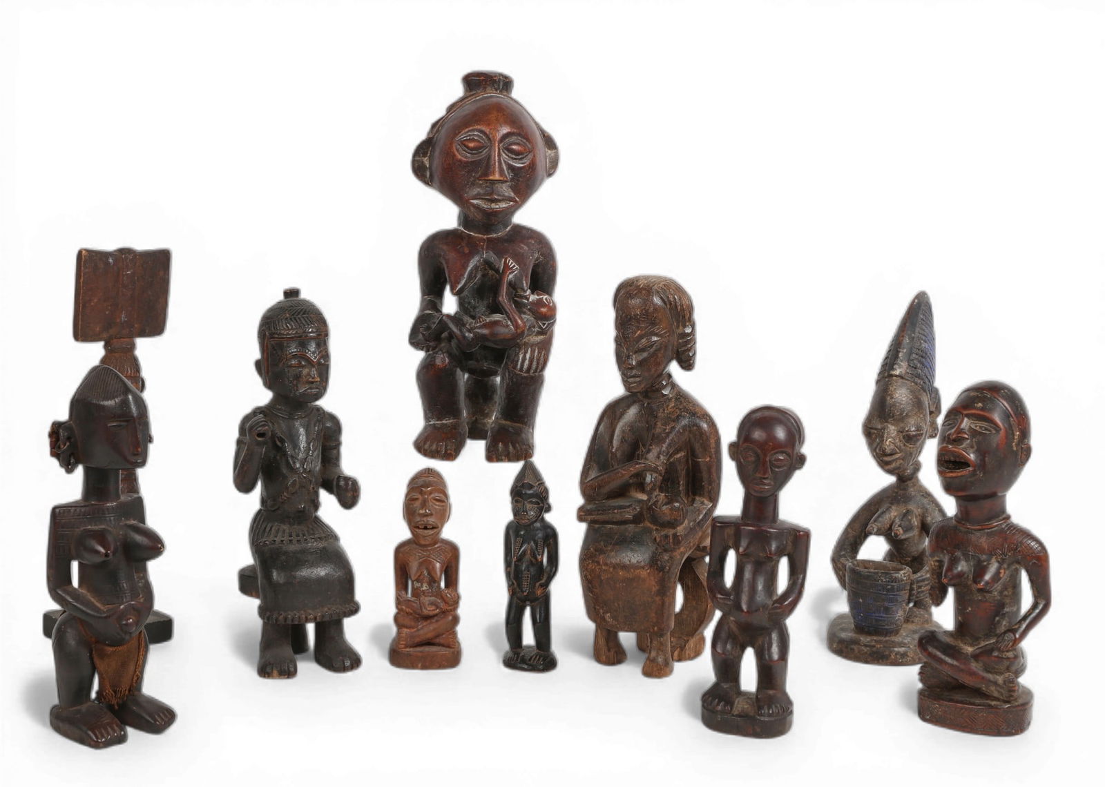 A group of ten carved wood African figures (1 of 3)
