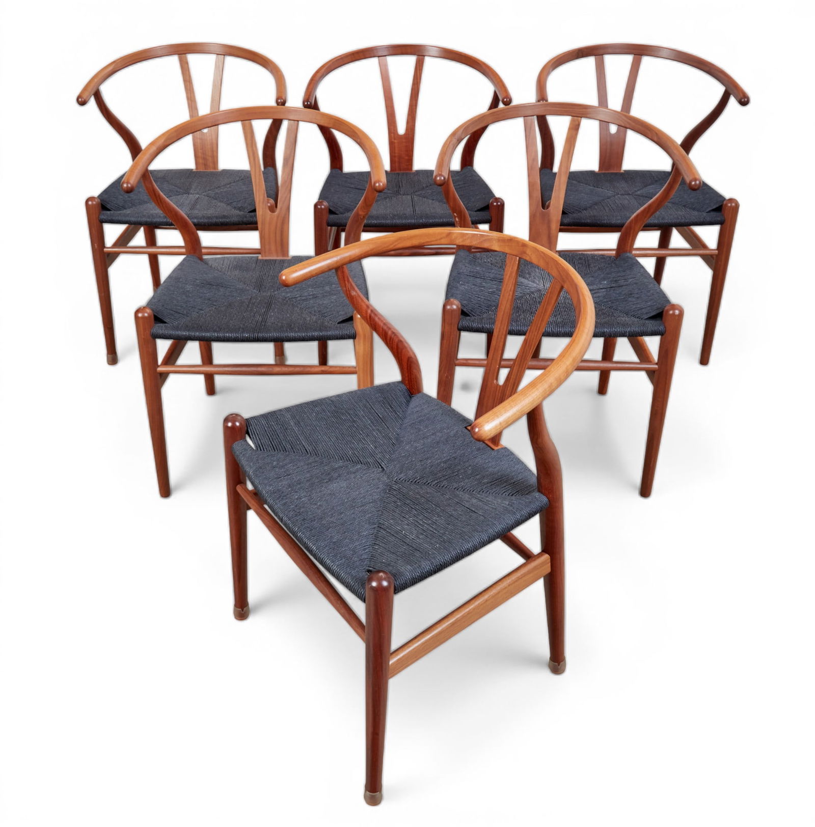A group of six Hans Wegner design arm chairs for Carl Hanson: A group of six Hans Wegner design arm chairs for Carl Hanson height 29 1/2 x width 21 x depth 20 in. (74.9 x 53.3 x 50.8 cm.)