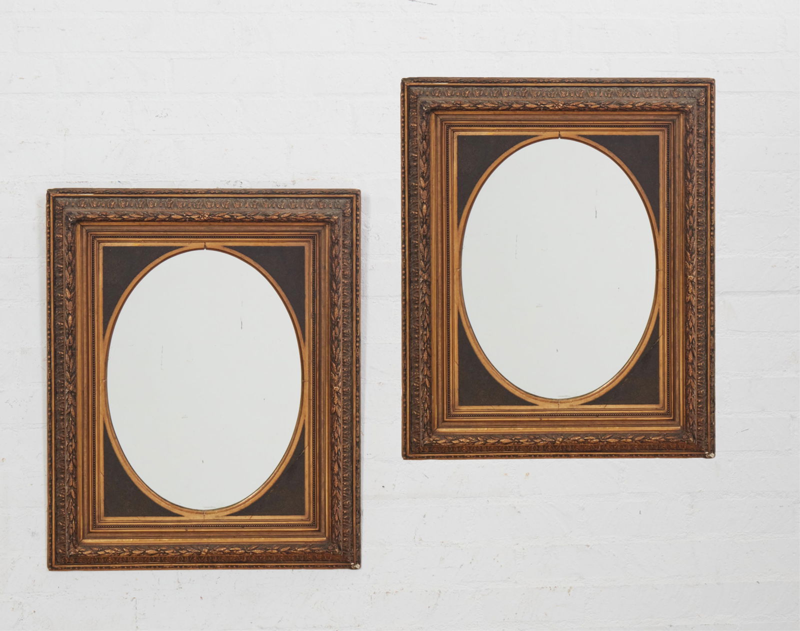 A pair of Neoclassical style giltwood and composition mirrors, 20th century (1 of 8)