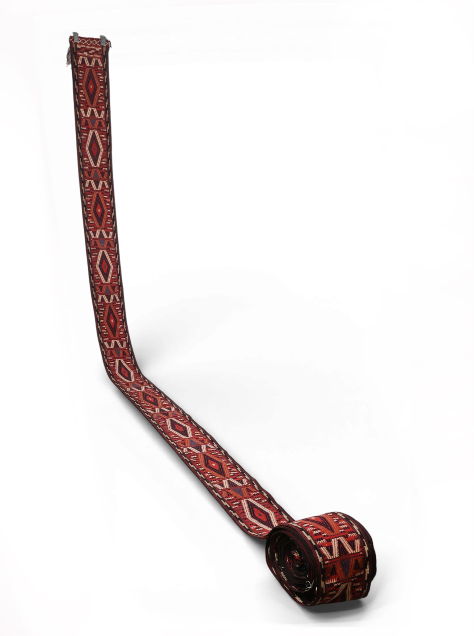 A vintage tribal woven Turkmen tent band, approx 670 inches long: A vintage tribal woven Turkmen tent band approx 670 inches long 17m long approximately height 55 ft 9 in x width 10 in. (1699.3 x 25.4 cm.)