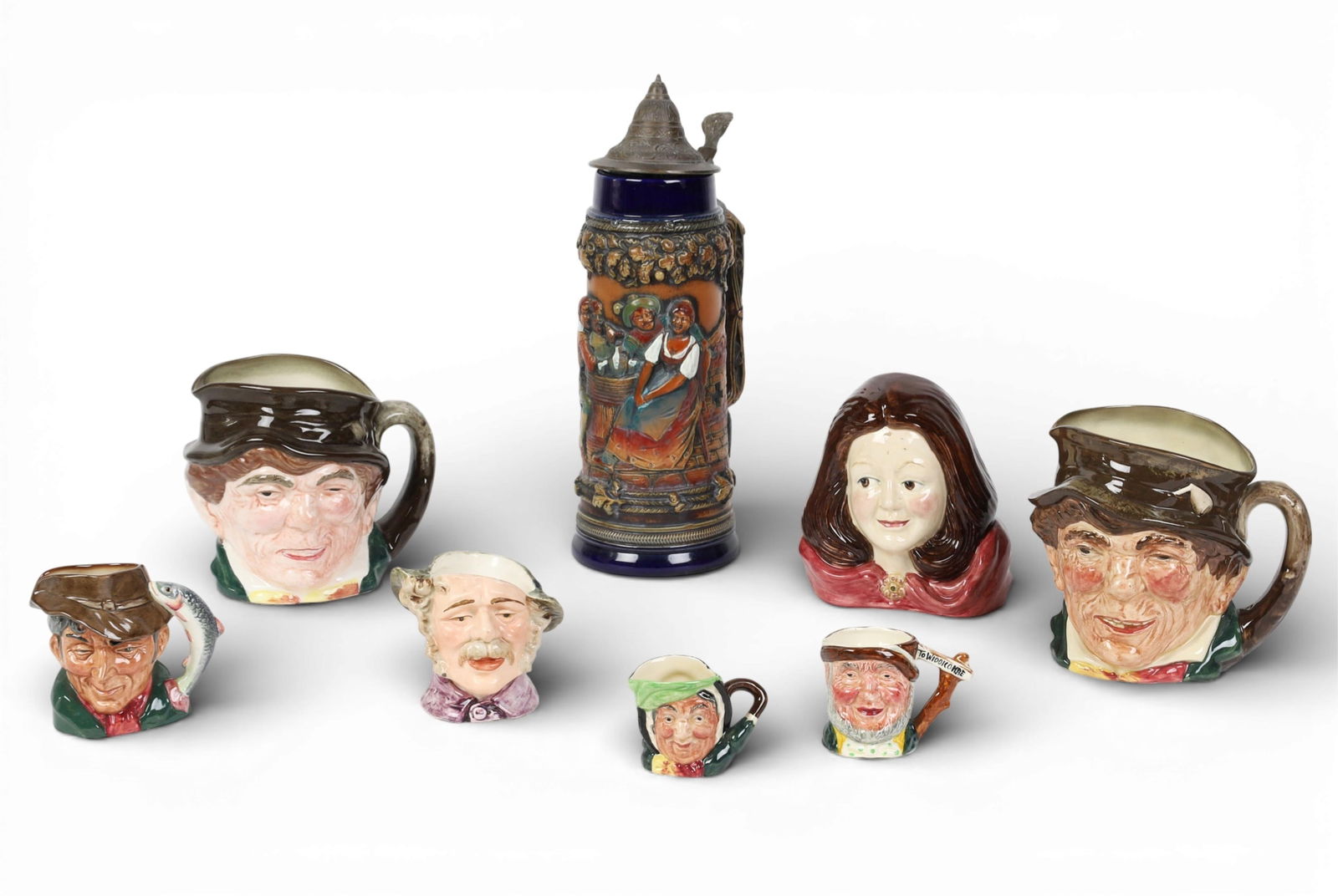 A group of seven Toby mugs together with a metal mounted tankard (1 of 10)