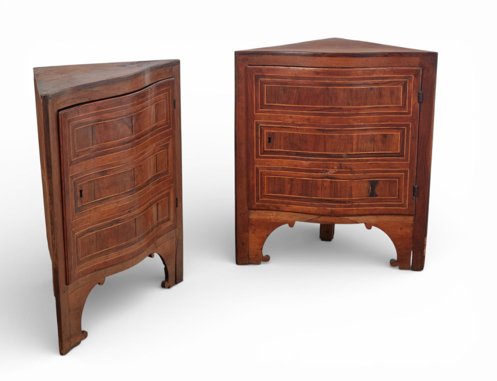 A pair of antique Italian Marquetry corner cabinets: A pair of antique Italian Marquetry corner cabinets height 34 1/4 x width 30 x depth 16 3/4 in. (87 x 76.2 x 42.5 cm.)