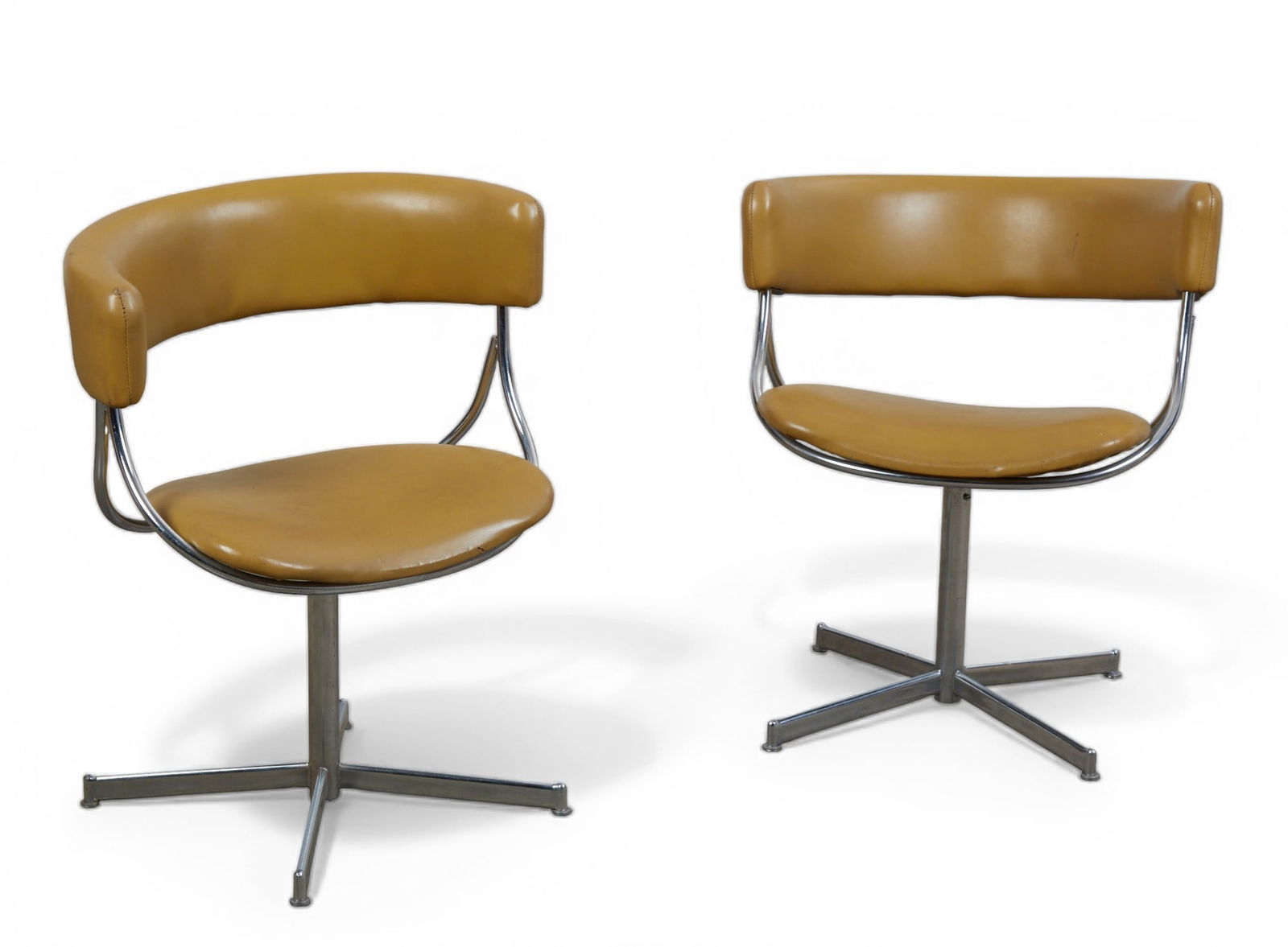 A pair of mid century modern swivel chairs (1 of 5)