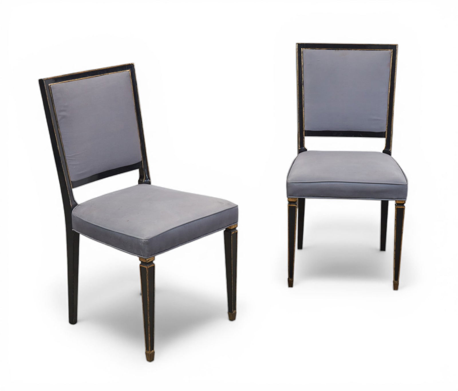 A pair of Maison Jansen brass mounted parcel gilt ebonzied side chairs, 20th century: A pair of Maison Jansen brass mounted parcel gilt ebonzied side chairs20th centuryheight 36 1/2in (93cm); width 18 1/2in (47cm) depth of seat 17in (43cm)