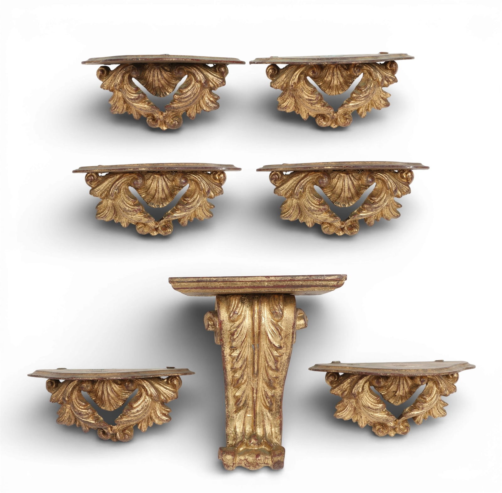 Seven Italian Baroque style giltwood brackets, 20th century: Seven Italian Baroque style giltwood brackets20th centuryStamped MADE IN ITALY.tallest height 10 1/4in (26cm); widest width 9 1/4in (23.5cm)