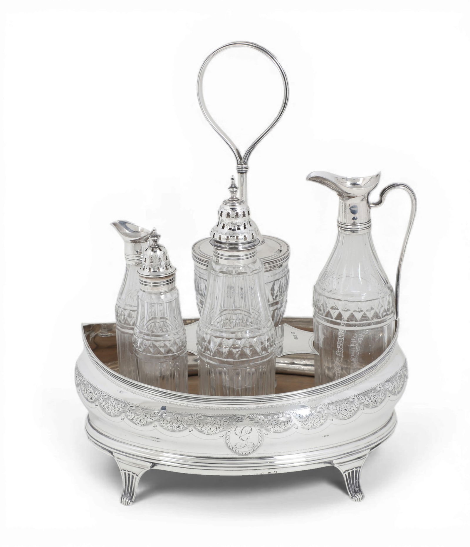 A George III sterling silver and glass part cruet set, Peter, Ann & William Bateman, London, 1802: A George III sterling silver and glass part cruet setPeter, Ann & William Bateman, London1802Initial: G. (6)overall height 11in (28cm); width 8 1/2in (22cm); depth 5 1/4in (13cm)