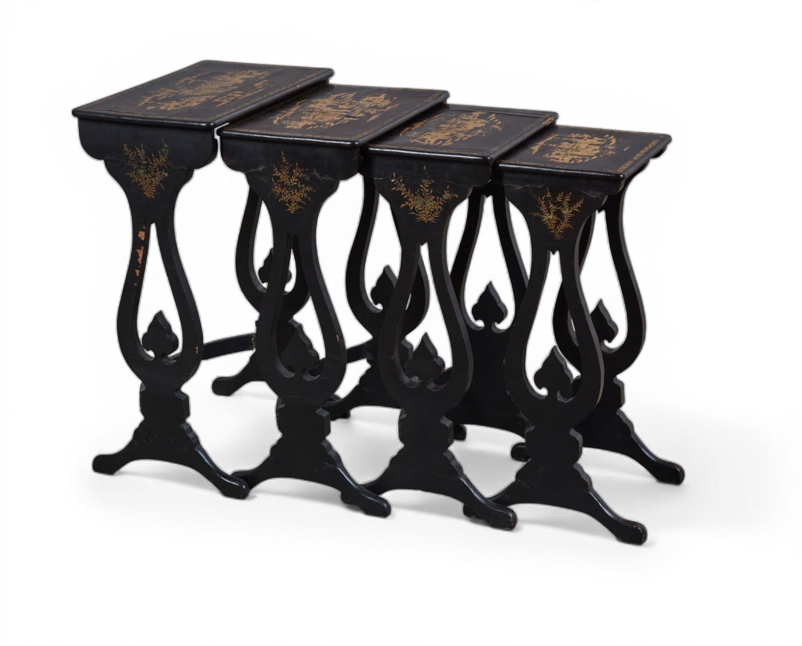 A nest of four Chinese Export parcel gilt black lacquered tables, second half 19th century: A nest of four Chinese Export parcel gilt black lacquered tablessecond half 19th centurylargest height 29in (74cm); width 19 1/2in (50cm); depth 12in (30.5cm) Provenance:Property from the Collection