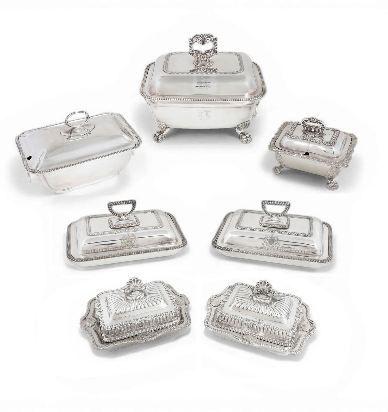 A group of seven English silverplate covered serving wares, 19th-early 20th century: A group of seven English silverplate covered serving wares19th-early 20th centurySome with heraldic engraving.larger tureen height 10in (25.5cm) width 12in (30.5cm); depth 9in (23cm)